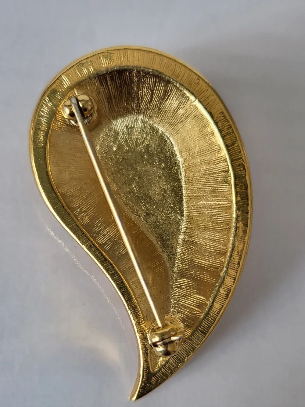 Vintage Avon Gold-Tone Leaf Brooch with Red Green Blue and Amber Accents